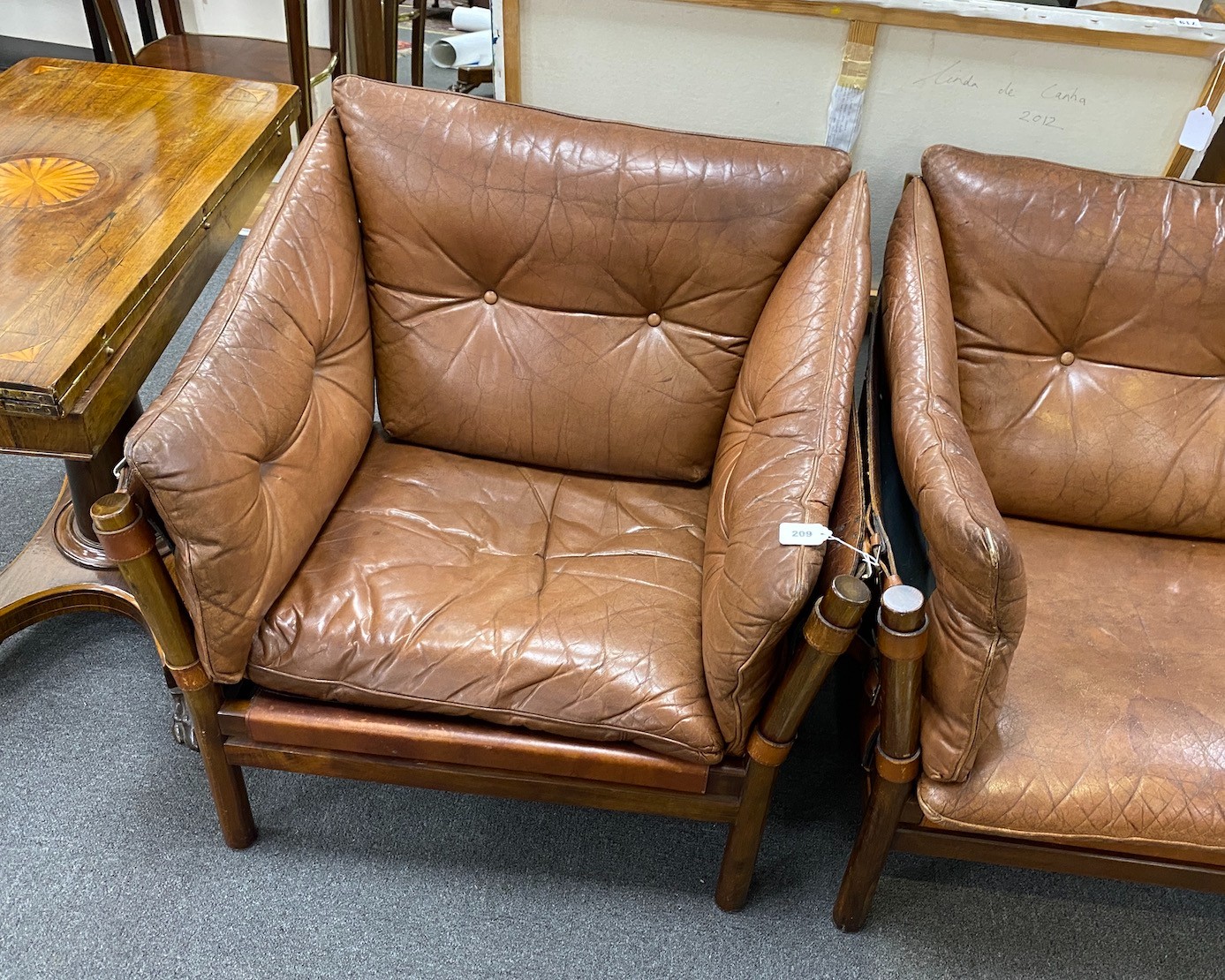 An Arne Norell Ilona settee and two chairs, manufactured by Aneby Mobler in 1960's, settee length 150cm, depth 73cm, height 77cm